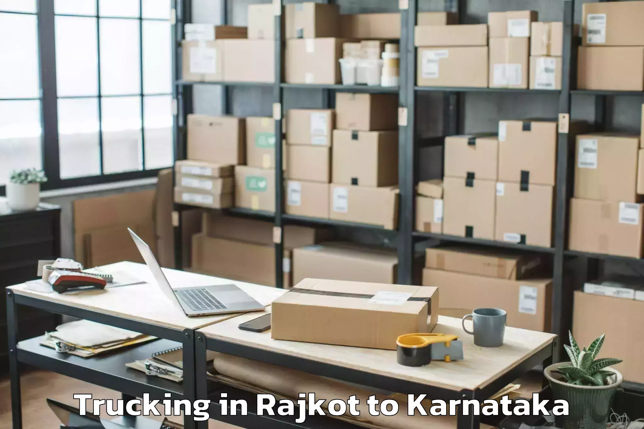 Comprehensive Rajkot to Gauribidanur Trucking